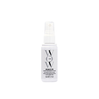 White spray bottle labeled 'WOW' on a white background