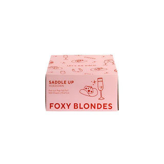 A pink box with text and graphics indicating it is a product from Foxy Blondes, featuring 500 sheets of pre-cut foil for salon use.