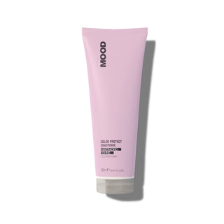 A pink tube of MOOD Color Protect Conditioner designed for moisturizing dyed or treated hair.