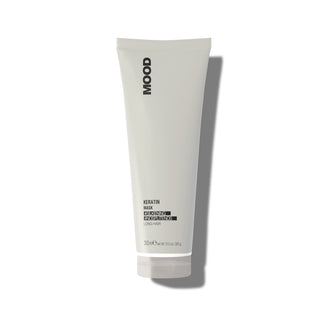 A white tube of MOOD Keratin hair mask 300ml with black text and details.