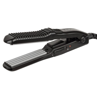 Black hair straightener on a white background
