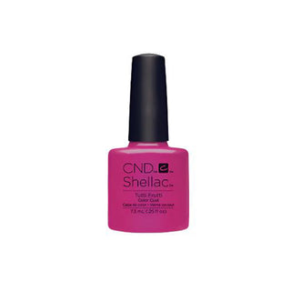 Pink nail polish bottle with black cap on a white background