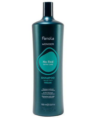 A 1000 ml bottle of Fanola Wonder No Red Extra Care Shampoo, featuring a dark teal-green bottle with a black cap and white and teal text on a plain white background.