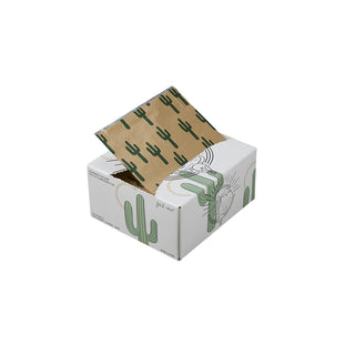 Box with cactus-patterned paper on a white background
