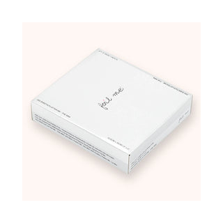 A white rectangular product box with the brand name 'foil me' written in black script on the top, photographed at an angle on a pale pink background.