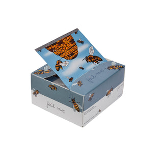 Box with bee and honeycomb design on a white background
