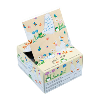 A decorative display box for FOIL ME foil, featuring a whimsical illustration of ducks, frogs, butterflies, and flowers on a cream-colored background. The top flap is propped open, showing the product's branding and slogan.
