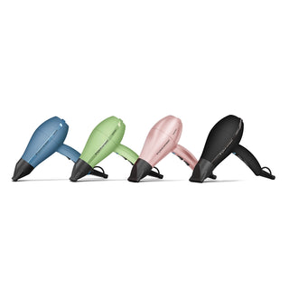 Four hair dryers in blue, green, pink, and black on a white background