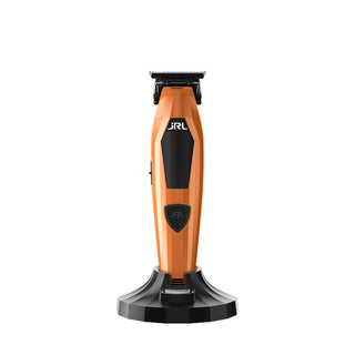 Orange and black hair trimmer on a white background