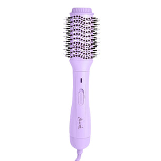 Purple hair styling tool with bristle head on a white background