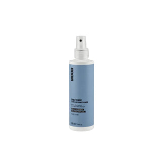 Bottle of MOOD Daily Care Leave-In Conditioner on a white background