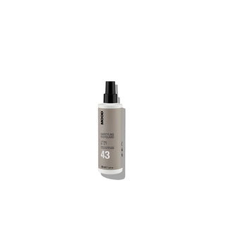 Hair spray bottle with a white label on a white background