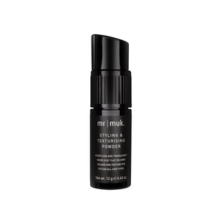 Black bottle of mr muk styling and texturising powder on a white background