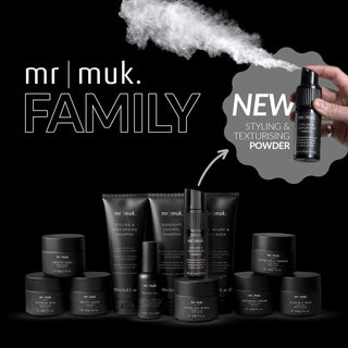 Mr Muk hair care product line with a hand holding a bottle of powder on a black background