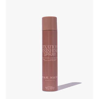 Nak Hair fixation finishing spray bottle on a white background
