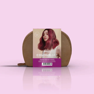 Hair color kit packaging with a pink background