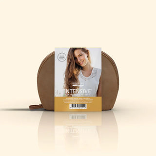 Brown hair care product with packaging featuring a woman's face on a beige background