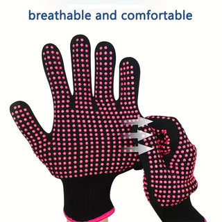 Pink and black glove with textured surface on a white background