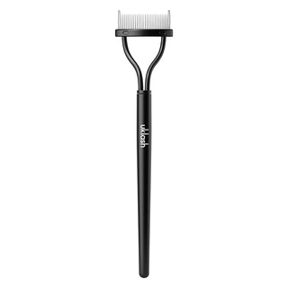 Black eyelash comb with 'uk lash' branding on a white background