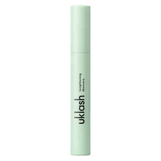 Mint green mascara tube with 'uklash' branding on a white background