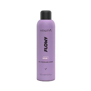 A lavender purple aerosol can of Vitality's Flowy No-Pressure Spray, featuring a black cap and black text, centered on a plain white background.