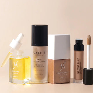 Vani-T skincare products including serum, foundation, and concealer on a beige background